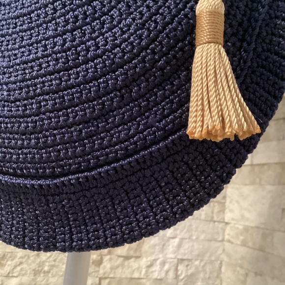 The Sak Ryder crochet crescent crossbody bag in navy blue with a tassel - Picture 6 of 14